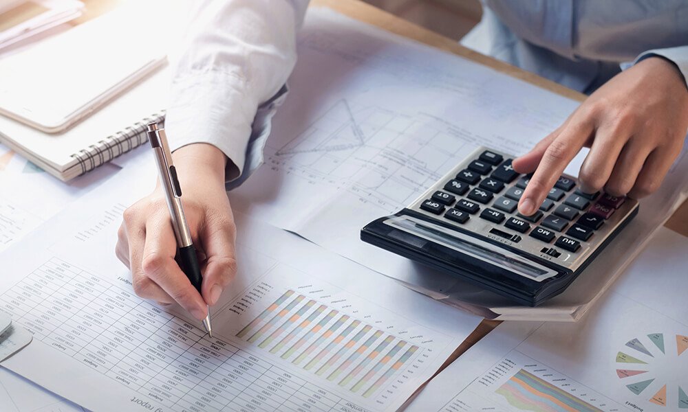 finance-accounting-concept-business-woman-working-desk-using-calculator finance-accounting-concept-business-woman-working-desk-using-calculator